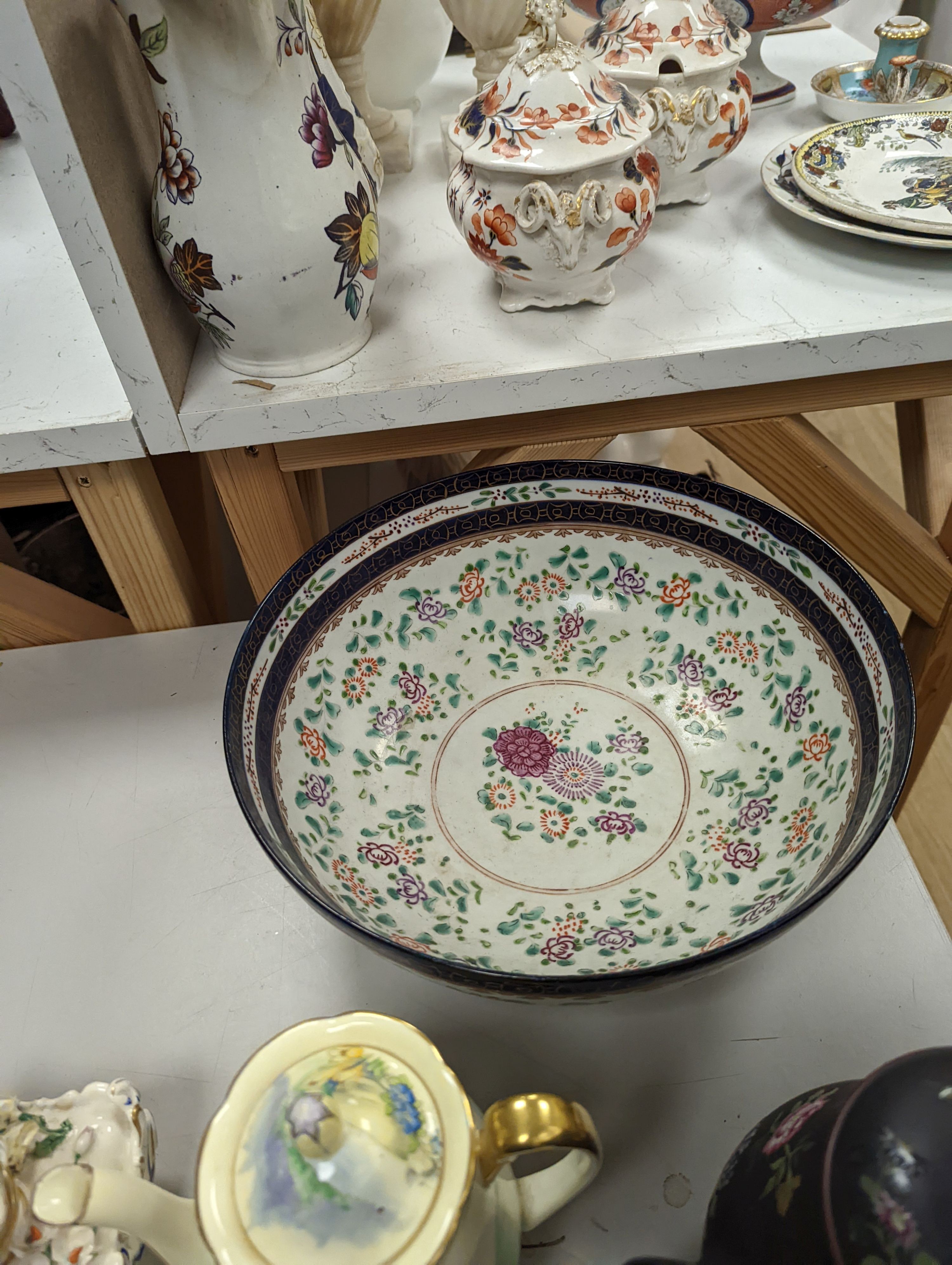 A collection of mixed porcelain including a Samson style bowl, Wedgwood teapot, Noritake vases etc